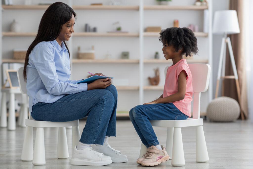 Child and therapist talk