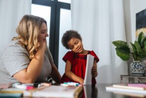 Woman and child at table